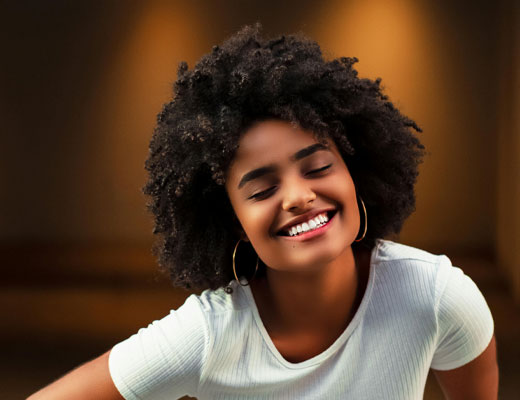 A woman smiling